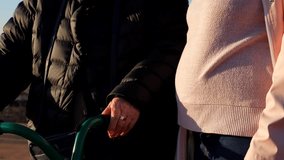 Old wrinkled hand gently touching baby bump, symbolizing family bond and new life - Powered by Shutterstock - Get 15% off with code: PIKWIZARD15