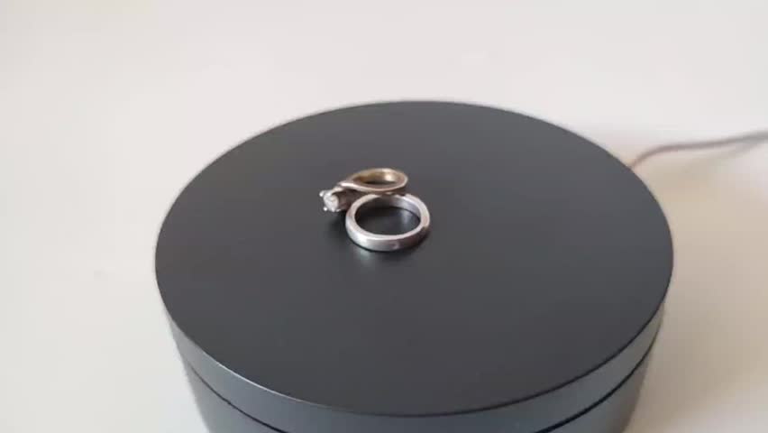 wedding ring on white background with rotating base