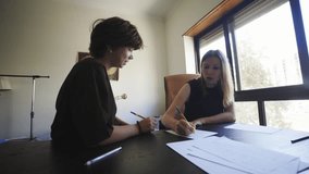 Teenage student and teacher working together on a project - Powered by Shutterstock - Get 15% off with code: PIKWIZARD15