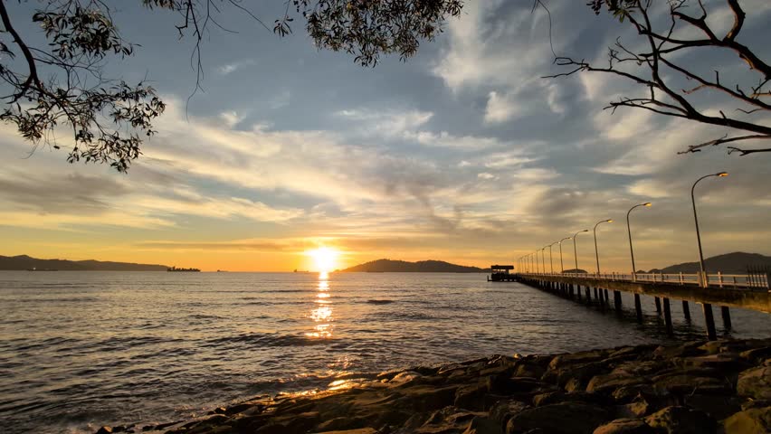 Timelapse sunset over Odec Beach Kota Kinabalu Sabah, Malaysia