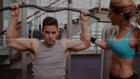 Man gripping wide pull-down bar with trainer guiding posture as performing lat pulldown gym workout. Strength training, personal coaching, gym environment, fitness motivation, muscular development, - Powered by Shutterstock - Get 15% off with code: PIKWIZARD15