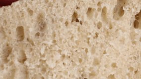 closeup of hand squeezing soft fresh bread crumb showing fluffy airy texture and bounce in homemade bread slice concept of bakery shop cooking blog artisan bread - Powered by Shutterstock - Get 15% off with code: PIKWIZARD15