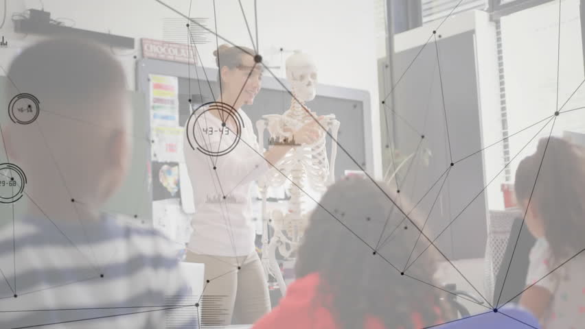 Teacher gripping skeleton clavicle and gesturing to ribcage for science lesson, data overlay fading. Education, science, anatomy, classroom, teaching, learning, digital - Powered by Shutterstock - Get 15% off with code: PIKWIZARD15