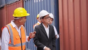 Asian supervisor, employee workers conduct warehouse inspection. They examine cargo containers. Logistics operations. Inventory management. Efficient supply chain distribution. - Powered by Shutterstock - Get 15% off with code: PIKWIZARD15