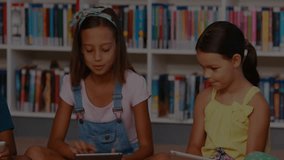 Two schoolgirls using tablets while green line graph appearing initiating education data comparison. Children, education, digital learning, collaboration, age group, classroom, creative - Powered by Shutterstock - Get 15% off with code: PIKWIZARD15