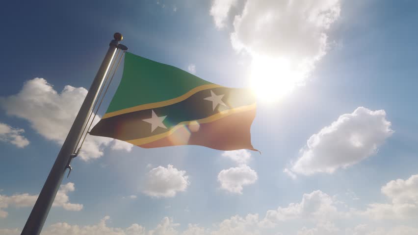 Saint Kitts and Nevis Flag waving on a Flagpole with a cloudy blue sky background