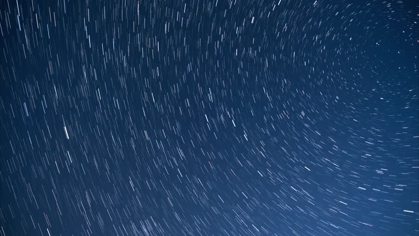 Moving Star Trails On A Dark Night Sky In A Time Lapse