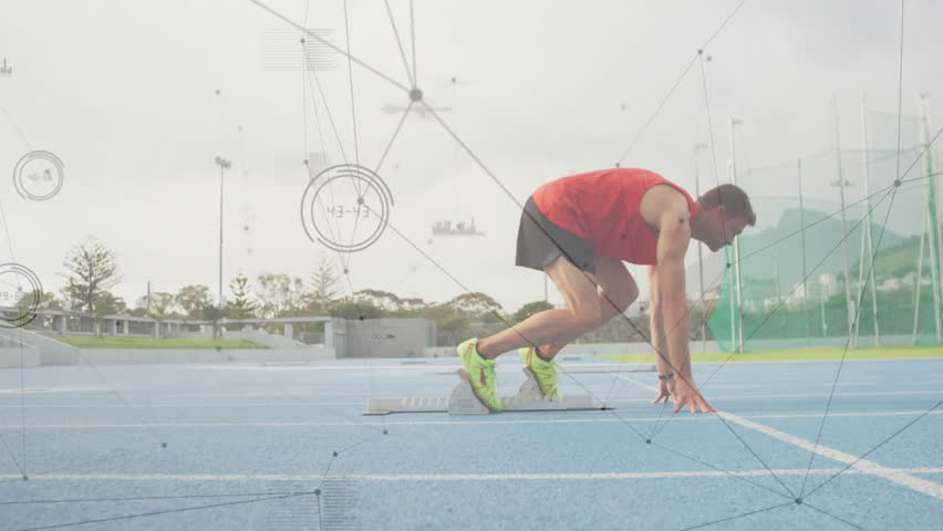 Sprinter bracing on start signal and propelling from blocks, with sports technology data overlay. Athletics, performance, speed, competition, training, dynamic, motion