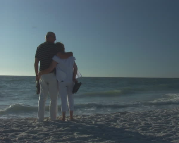 PAL: Senior couple on beach 