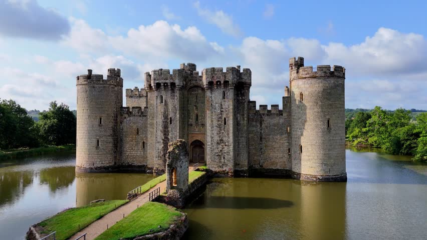 Experience a dramatic drone lift from Bodiam Castle’s bridge walkway, tilting to reveal the stunning interior. Perfect for cinematic storytelling and historical projects.