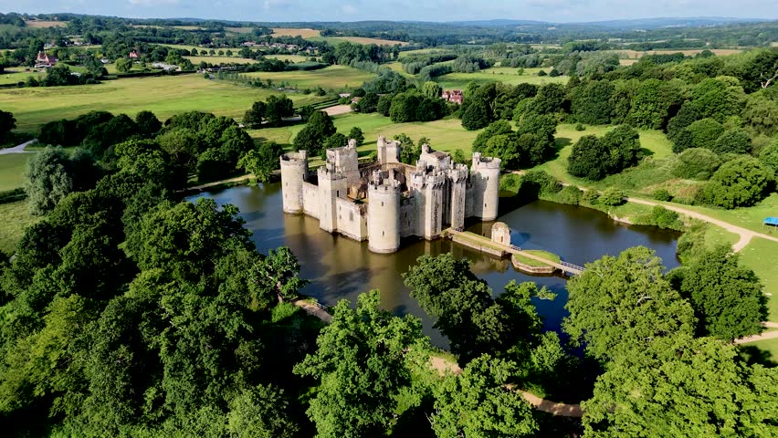 Soar over and towards Bodiam Castle with immersive 4K drone footage. Perfect for storytelling, travel features, and educational media.