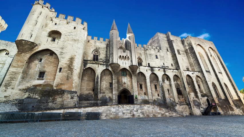Palace of the Popes or Palais des Papes in Avignon city, southern FranceAvignon. Provence. Panorama of the papal palace at night.Avignon, France - with its ancient streets, restored medieval fortress 