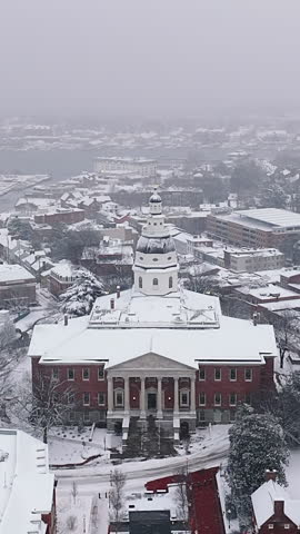 Vertical View Of Maryland State House During Blizzard In Winter In Annapolis, Maryland, USA. - aerial shot