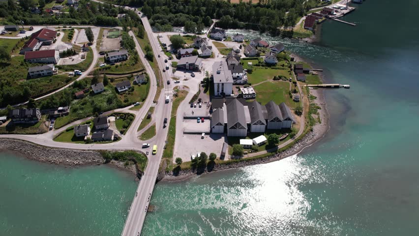An aerial view of a settlemen of a village or small town, situated along a body of water in Skjolden, Norway.