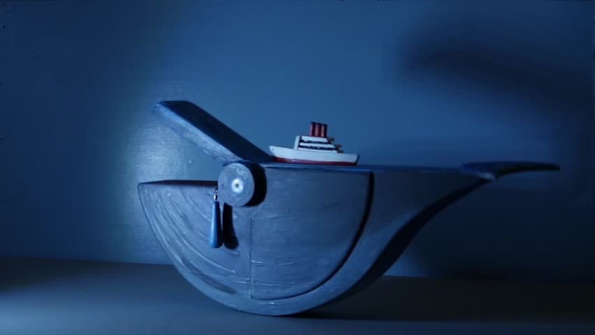 huge blue whale and steamship kinetic sculpture slow motion loop