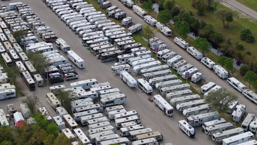 RV dealer selling new motorhomes and camping travel trailers in Florida. USA vehicle camping industry.