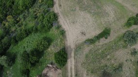 Steep Dirt Road Through Plowed Fields and Forest in Rural Mountainous Greece - Powered by Shutterstock - Get 15% off with code: PIKWIZARD15