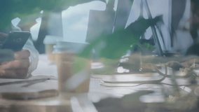 Mid adult man using tech and tapping smartphone screen as seascape overlay merging with workspace. Technology, workspace, modern, relaxation, innovation, serene, productivity - Powered by Shutterstock - Get 15% off with code: PIKWIZARD15