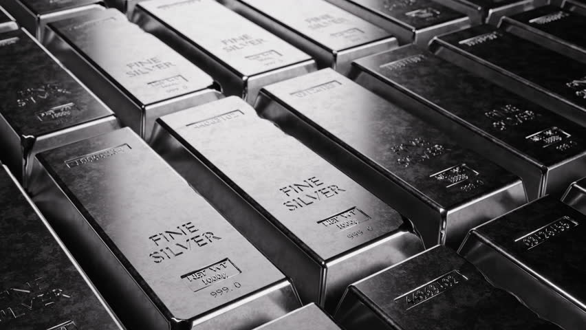 Stacked silver bullion bars with 999 purity. Ideal for financial, banking, investment, savings, and precious metals themes. Perfect for economic and wealth-related content or videos. Looped video