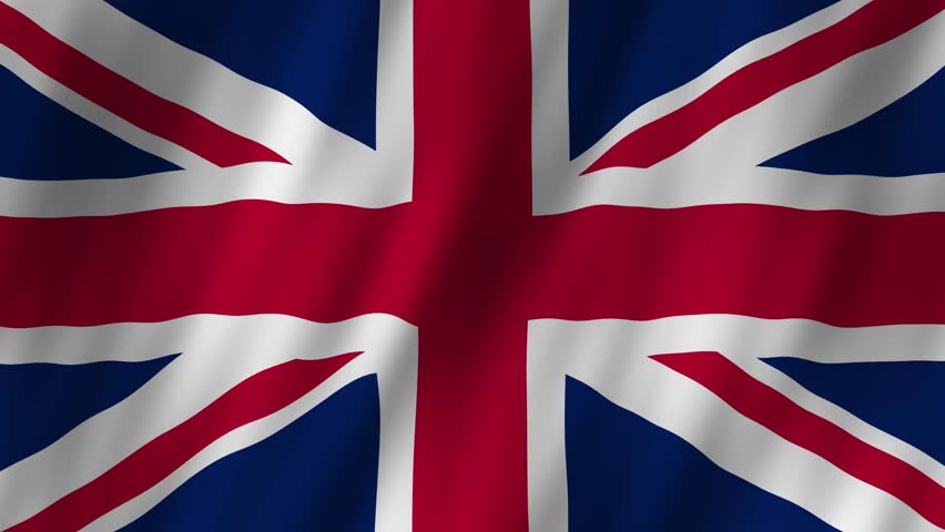 United Kingdom flag waving proudly in the bright sunlight