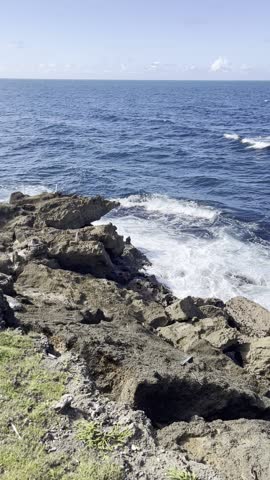 Waves Crashing along Rocks in Puerto Rico
