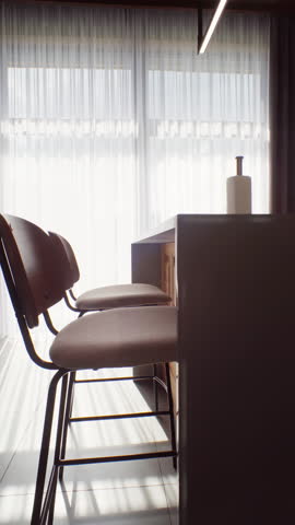 Tall-backed armchair and console as diffused daylight floods through full-height terrace glazing, blending classic comfort with modern architecture for hospitality teasers.