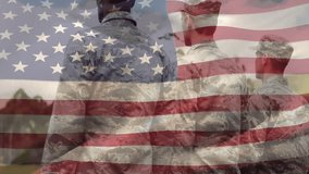 Three soldiers standing on military base, wind lifting flag while rightmost soldier saluting flag. Patriotism, discipline, unity, bravery, outdoor, nature, reverence - Powered by Shutterstock - Get 15% off with code: PIKWIZARD15