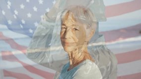 Camera revealing American flag focusing on woman smiling and soldier saluting in patriotic tribute. Patriotism, respect, tribute, unity, solemnity, honor, diversity - Powered by Shutterstock - Get 15% off with code: PIKWIZARD15