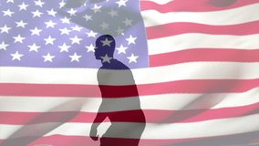 With ball appearing soccer athlete trapping ball doing bicycle kick over USA flag for marketing. Athlete, patriotism, dynamic, silhouette, motion, agility, performance - Powered by Shutterstock - Get 15% off with code: PIKWIZARD15