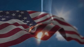 Breeze causing flag fluttering and confetti swirling with lens flare celebrating national pride. Patriotism, celebration, outdoor, motion, vibrant, abstract, festive - Powered by Shutterstock - Get 15% off with code: PIKWIZARD15