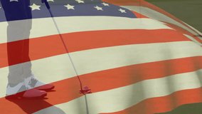 Male golfer placing golf ball on turf and practicing precision putting while flag overlay waving. Athleticism, precision, patriotism, outdoor, recreational, sport, motivation - Powered by Shutterstock - Get 15% off with code: PIKWIZARD15