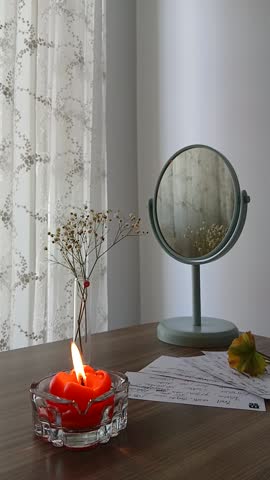 Reflected Warmth: Stillness in Flame and Bloom
