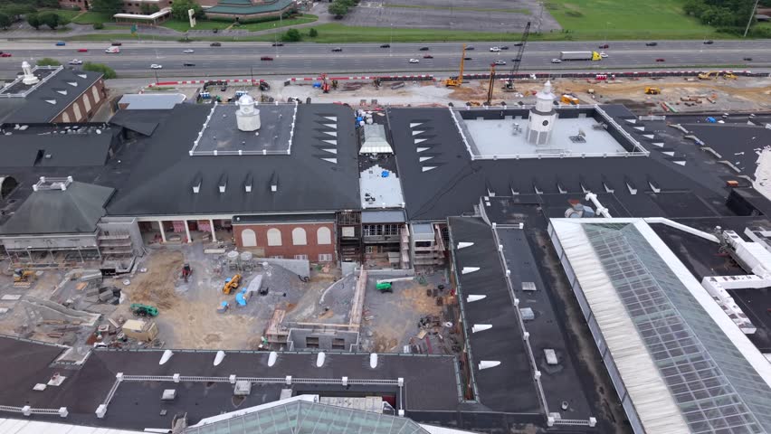 Pullback Aerial Shot Of Glass Atrium At Gaylord Opryland Resort And Convention Center In Nashville, USA.