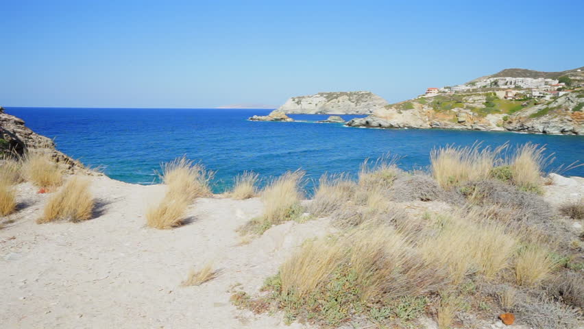 Breathtaking landscape of coast of Mediterranean sea with mountains - Crete, Greece. Beautiful, clear, blue sky and water.