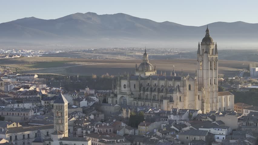 Aerial view of segovia cathedral surrounded by beautiful rooftops and historic buildings, segovia, segovia, spain.