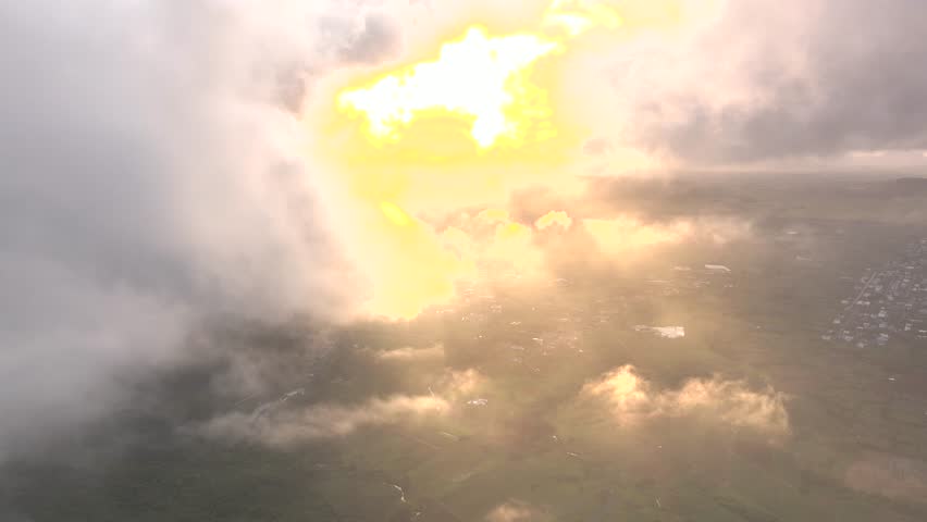 Aerial view of Le Pouce with dramatic clouds and a golden sunset, Moka, Port Louis, Mauritius.