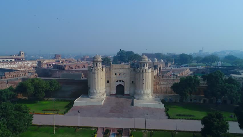 Aerial view of Lahore Fort and Badshahi Masjid surrounded by the historic Old City, Lahore, Punjab, Pakistan.