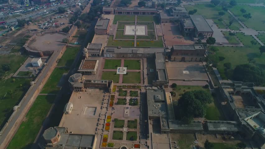Aerial view of Lahore Fort, Badshahi Masjid and Old City with historic architecture, Lahore, Punjab, Pakistan.