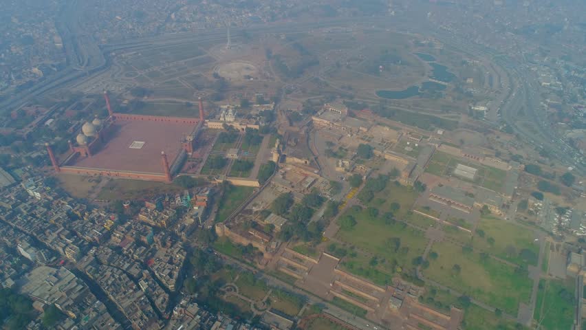 Aerial view of Lahore Fort, Badshahi Masjid and Old City in a beautiful urban landscape, Lahore, Punjab, Pakistan.
