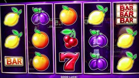 Casino slot machine screen with colorful fruit symbols like lemons, plums, oranges, cherries and red lucky number seven - Powered by Shutterstock - Get 15% off with code: PIKWIZARD15