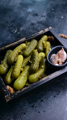 Crunchy pickled cucumbers, bursting with flavor, perfect for sandwiches, salads, or as a tangy snack. 