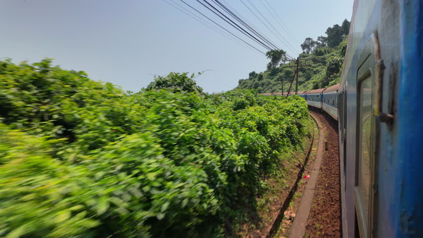 Lotus Express Train In Hai Van Pass Through Railways In Da Nang, Vietnam. POV Shot