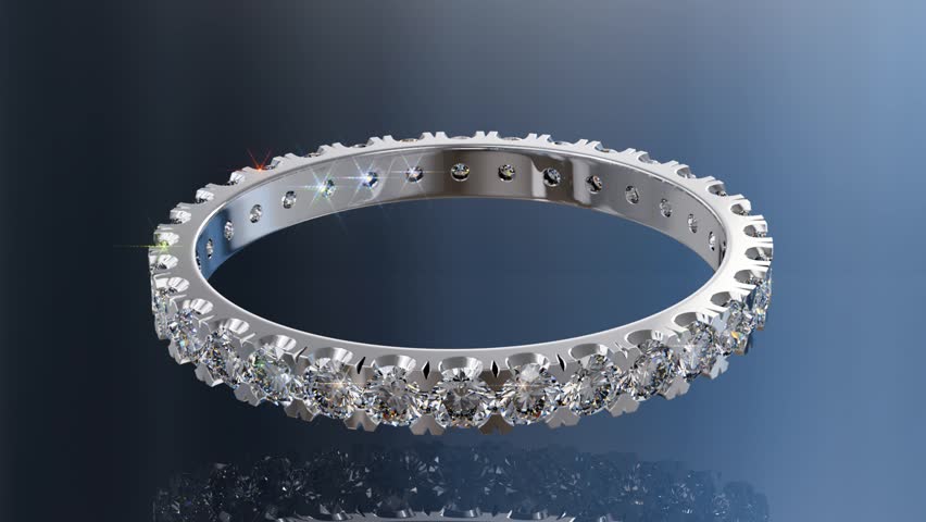 Diamond eternity ring rolling on blue glossy background. Seamless loop 3D animation