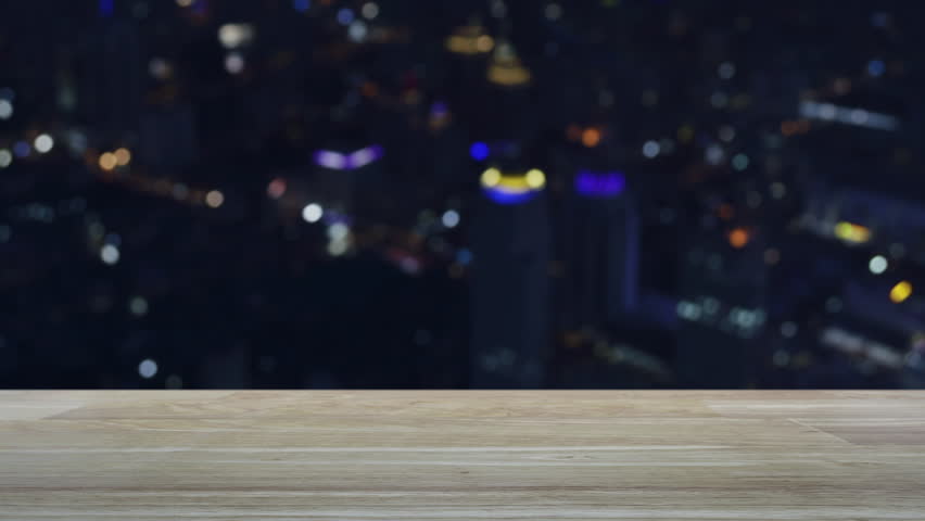 Power button icon on desktop modern computer monitor screen on wooden table over blur colorful night light city tower and skyscraper, Business start up online concept - Powered by Shutterstock - Get 15% off with code: PIKWIZARD15