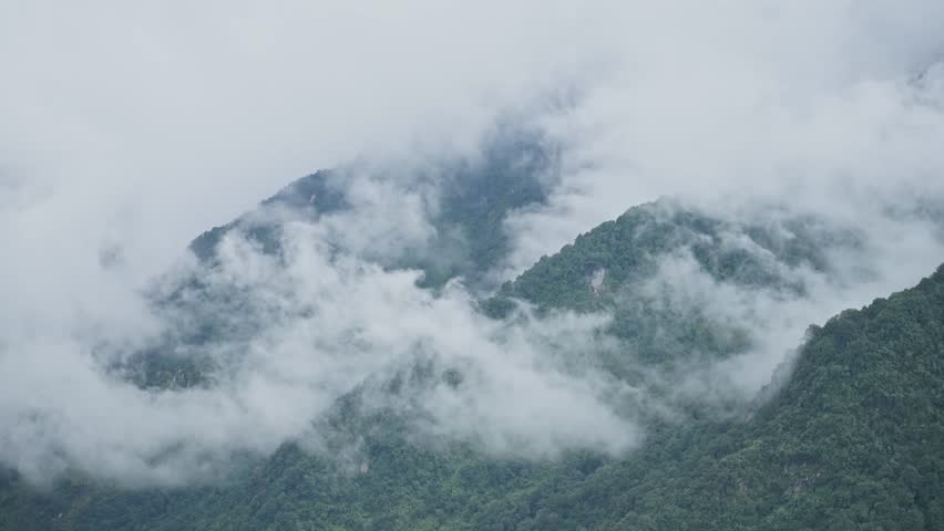 Nepal Timelapse of Clouds Moving in a Valley, Time Lapse of Cloud Rolling Quickly Over Tropical Rainforest Trees Scenery in the Himalayas Mountains Landscape in Annapurna Trekking Region