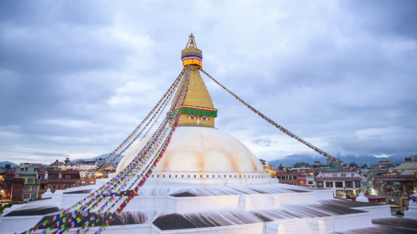 Day to Night Kathmandu Timelapse in Nepal, Time Lapse of Buddhist Boudhanath Stupa, a Famous Popular Landmark Tourist Attraction with Clouds Moving, Large Buddhism Monument