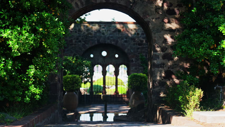 View of the gardens of the Chateau de la Napoule Castle in Mandelieu-La Napoule, France n daylight
