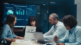 Diverse Business Team in Conference Room Meeting with Charts on Screen - Powered by Shutterstock - Get 15% off with code: PIKWIZARD15