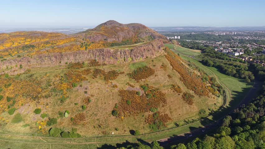 Aerial footage of Salisbury Crags and Arthur