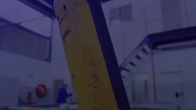 Digital overlay pulsing guiding maintenance worker climbing industrial staircase for platform check. Industrial, construction, safety, technology, progress, engineering, workflow - Powered by Shutterstock - Get 15% off with code: PIKWIZARD15